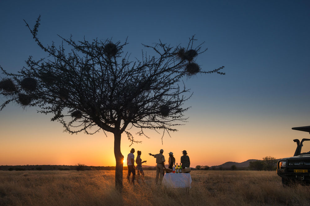 Sundowners at Ongava Lodge / O. Evans / Courtesy of Ongava Game Reserve luxury Etosha Namibia Africa safari