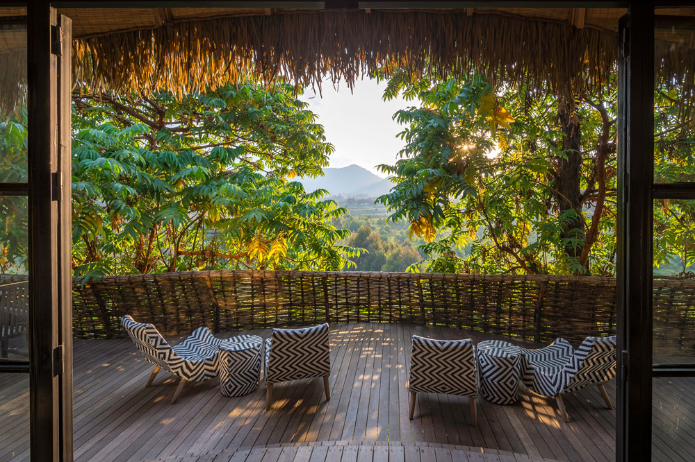 Balcony at Bisate Lodge, Rwanda luxury gorilla trekking safari / Caroline Culbert / Courtesy of Wilderness Safaris