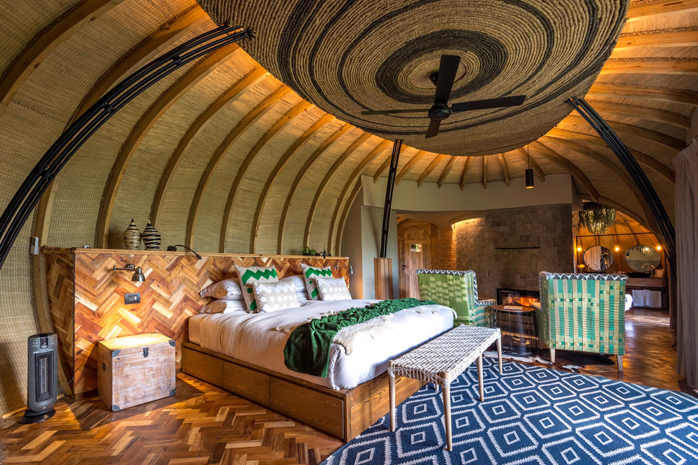 Bedroom at Bisate Lodge, Rwanda luxury gorilla trekking safari / Caroline Culbert / Courtesy of Wilderness Safaris