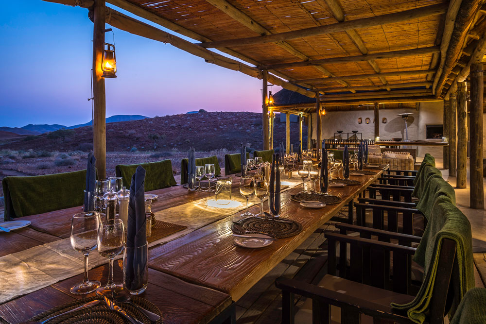 Dining at Damaraland Camp, Namibia luxury safari / Dana Allen / Courtesy Wilderness Safaris