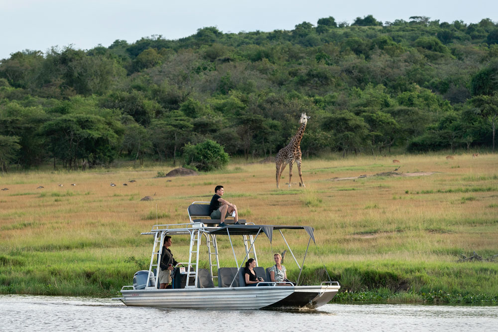 Boat safari at Magashi Camp, luxury Rwanda safari / Dana Allen / Courtesy of Wilderness Safaris