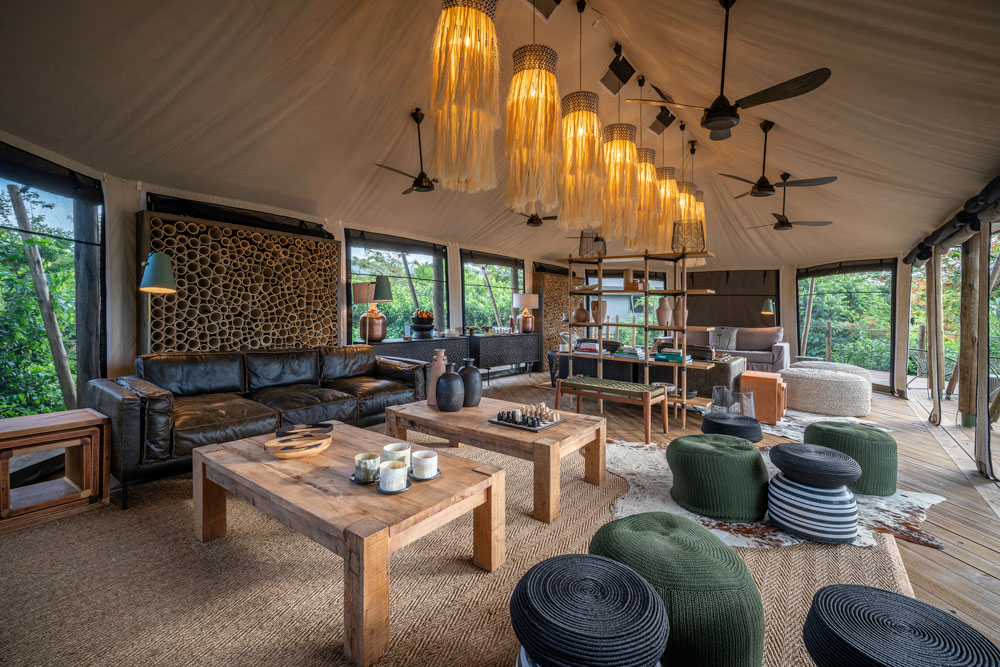 Tented lounge at Magashi Camp, luxury Rwanda safari / Dana Allen / Courtesy of Wilderness Safaris