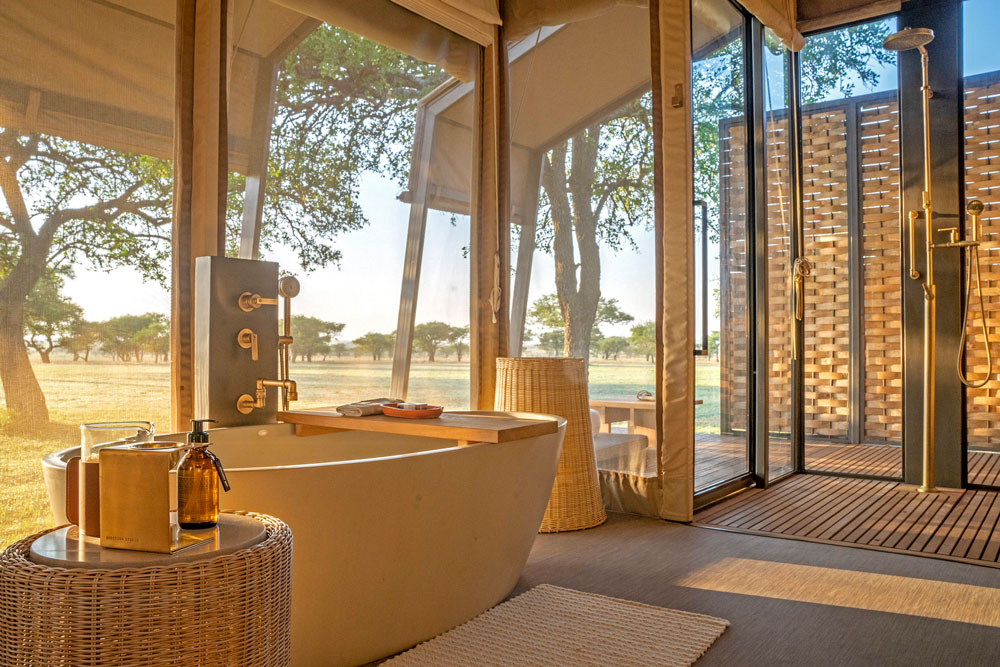 Bath at Singita Sabora Tented Camp, luxury Tanzania safari / Courtesy Singita