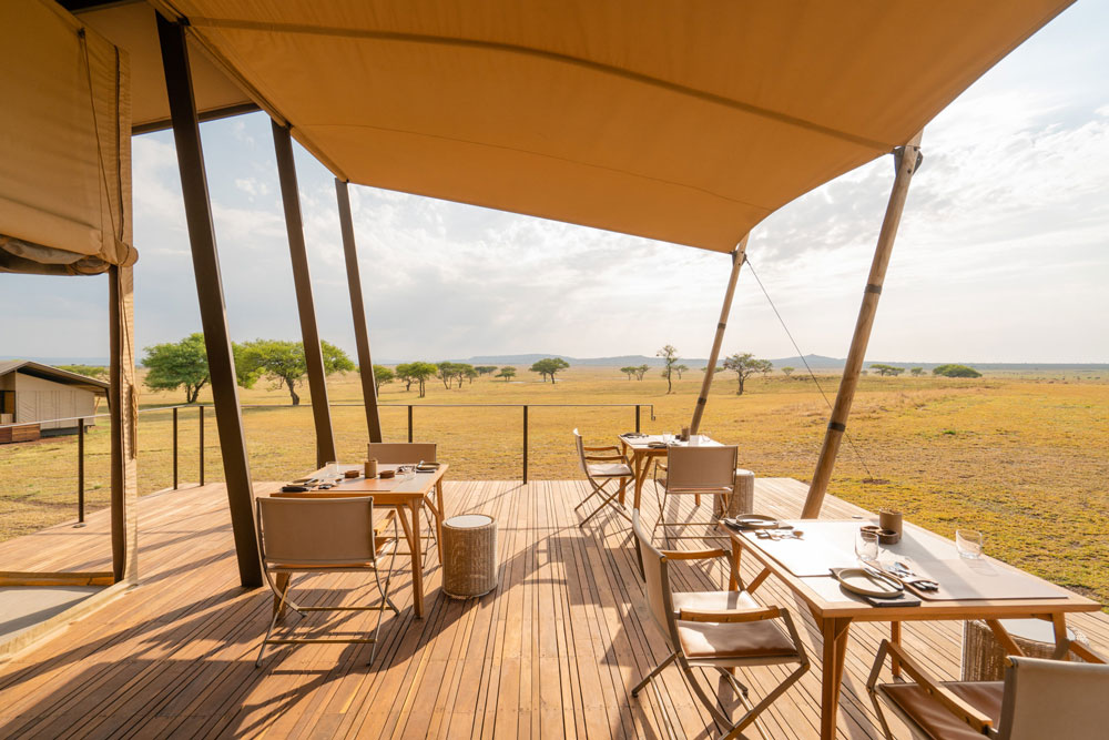 Dining deck at Singita Sabora Tented Camp, luxury Tanzania safari / Courtesy Singita