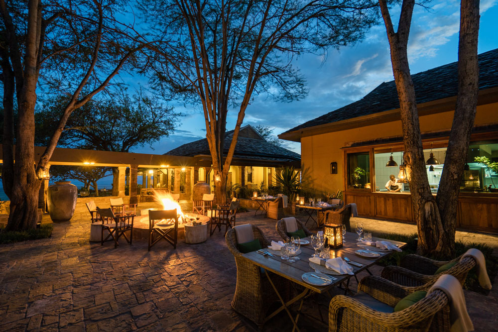 Dining area at Singita Sasakwa Lodge, luxury Tanzania safari / Courtesy Singita