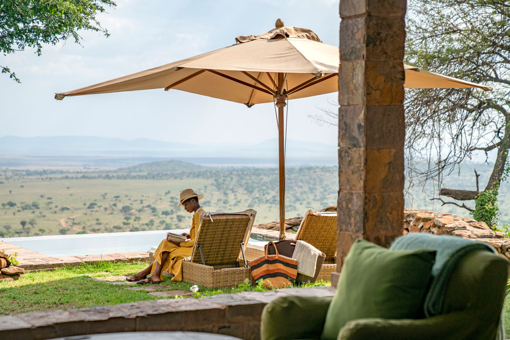 Lounge area at Singita Sasakwa Lodge, luxury Tanzania safari / Courtesy Singita