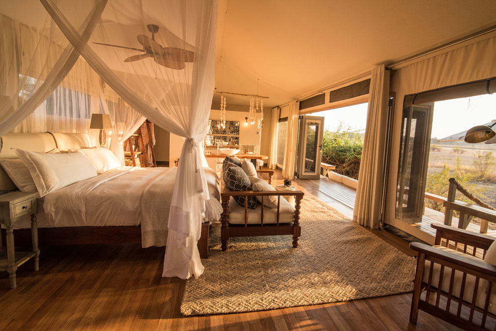 Bed at Chikwenya, Mana Pools, luxury Zimbabwe safari / Ruth and Kyle De Nobrega / Courtesy of Wilderness Safaris