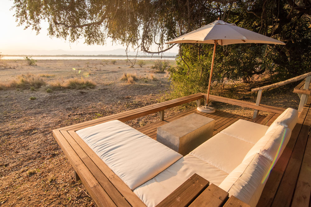 Deck at Chikwenya, Mana Pools, luxury Zimbabwe safari / Ruth and Kyle De Nobrega / Courtesy of Wilderness Safaris