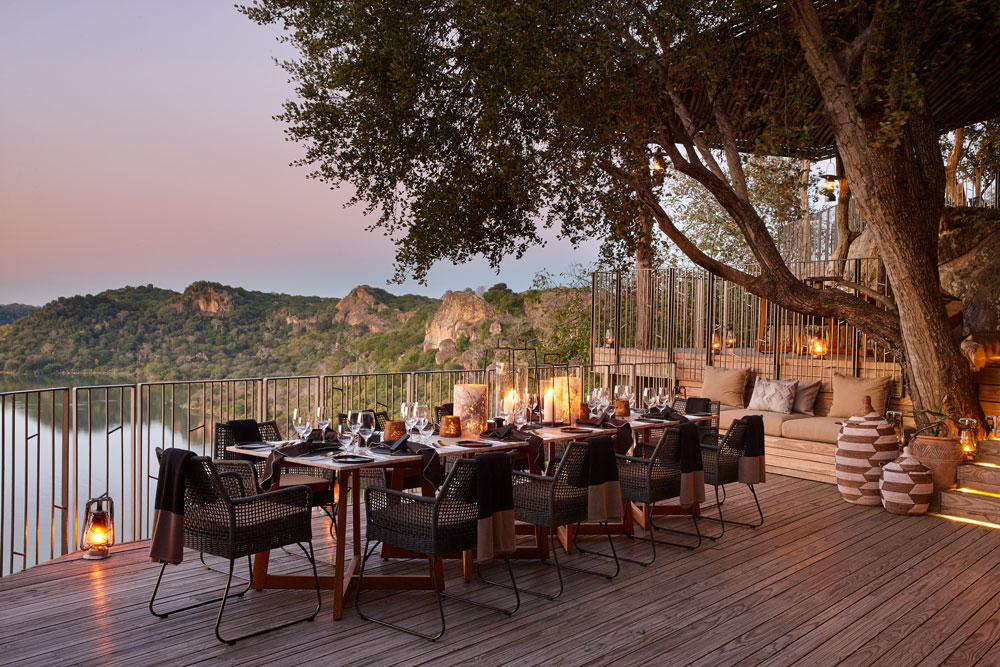 Dining at Singita Pamushana Lodge, luxury Zimbabwe safari / Courtesy Singita
