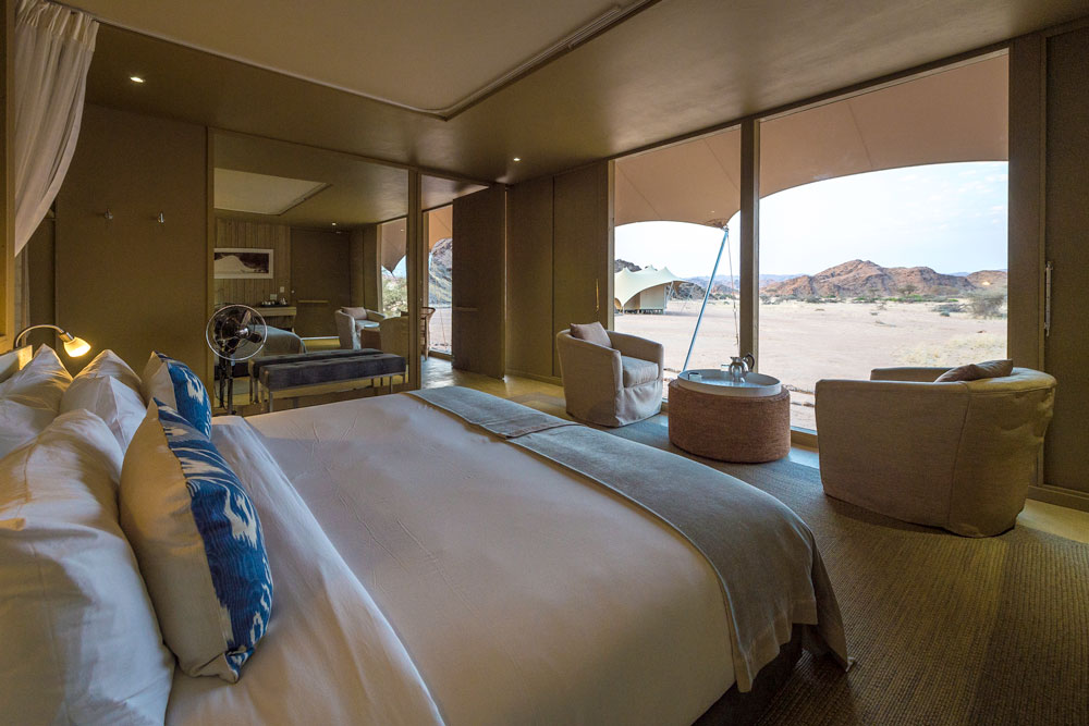 Bedroom at Hoanib Skeleton Coast Camp, luxury Namibia safari / Dana Allen / Courtesy of Wilderness Safaris