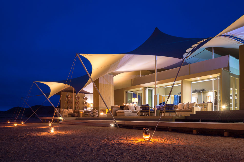 Lounge at Hoanib Skeleton Coast Camp, luxury Namibia safari / Dana Allen / Courtesy of Wilderness Safaris