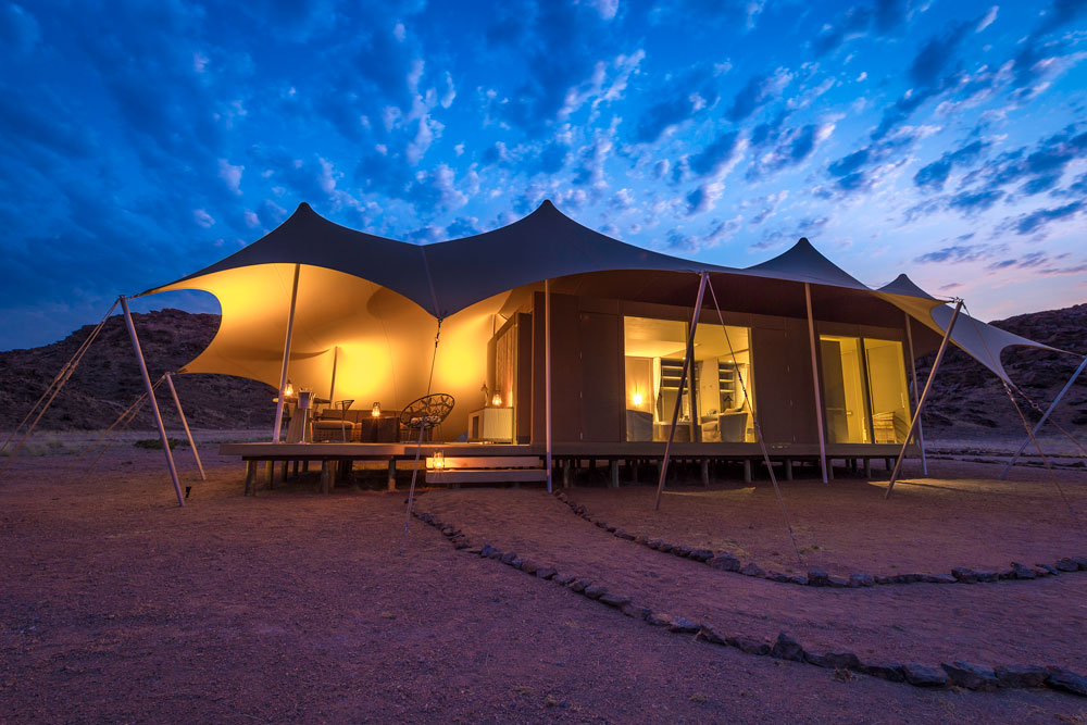 Exterior of Hoanib Skeleton Coast Camp, luxury Namibia safari / Dana Allen / Courtesy of Wilderness Safaris