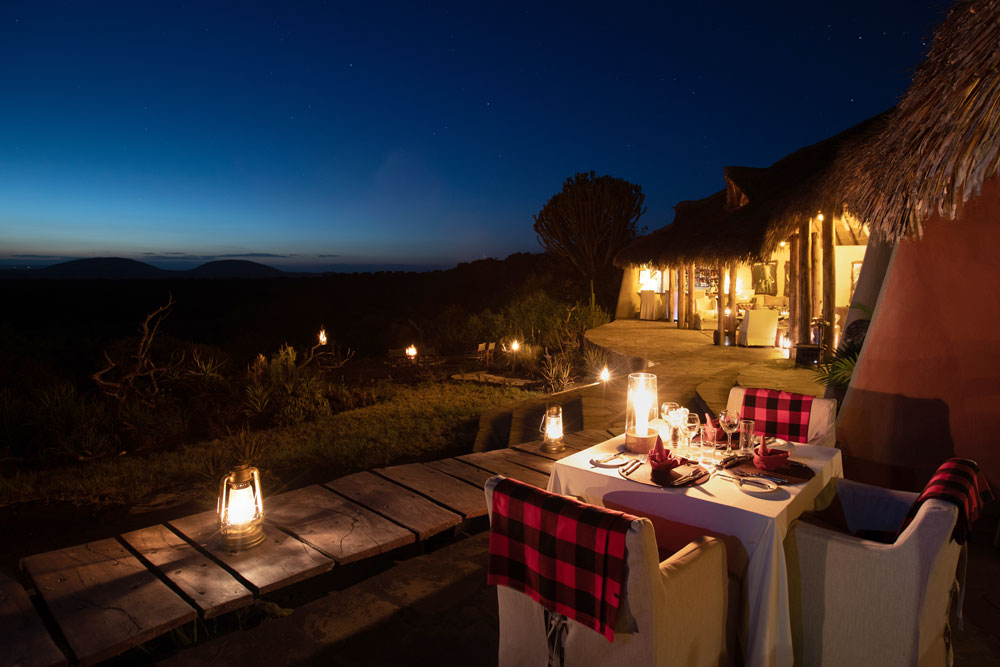 Dinner at Ol Donyo Lodge, luxury Kenya safari / Courtesy of Great Plains Conservation