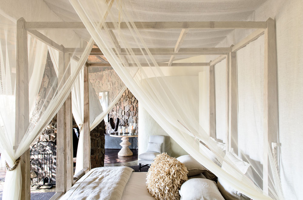 Bedroom at Singita Boulders Lodge, luxury South Africa safari / Courtesy Singita