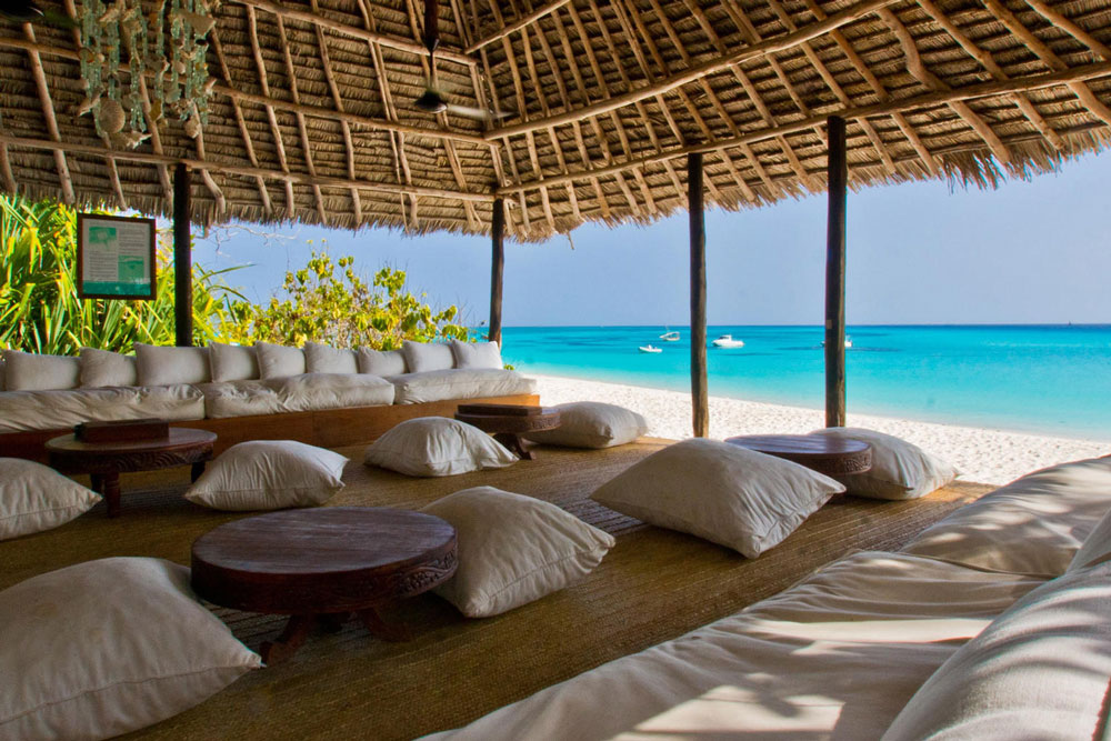 Beach lounge at &Beyond Mnemba Island / Courtesy of &Beyond luxury Zanzibar beach resort