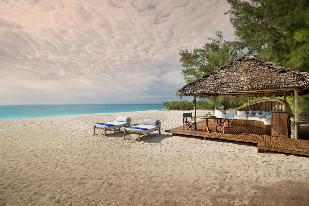 Beach lounge at &Beyond Mnemba Island / Courtesy of &Beyond luxury Zanzibar beach resort