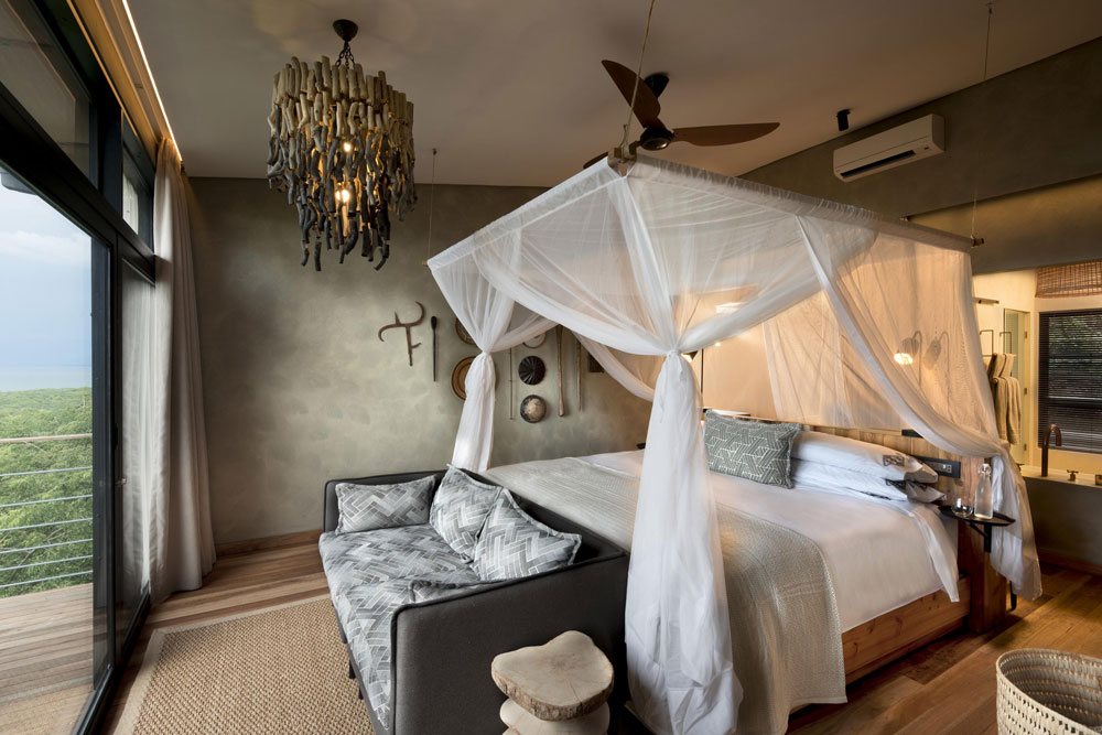 Bedroom at Bumi Hills Safari Lodge / Courtesy of African Bush Camps luxury Zimbabwe safari