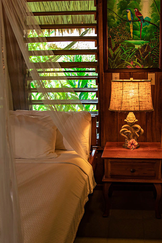 Cottage bedroom at Chan Chich Lodge / Courtesy of Chan Chich Lodge luxury Belize eco lodge
