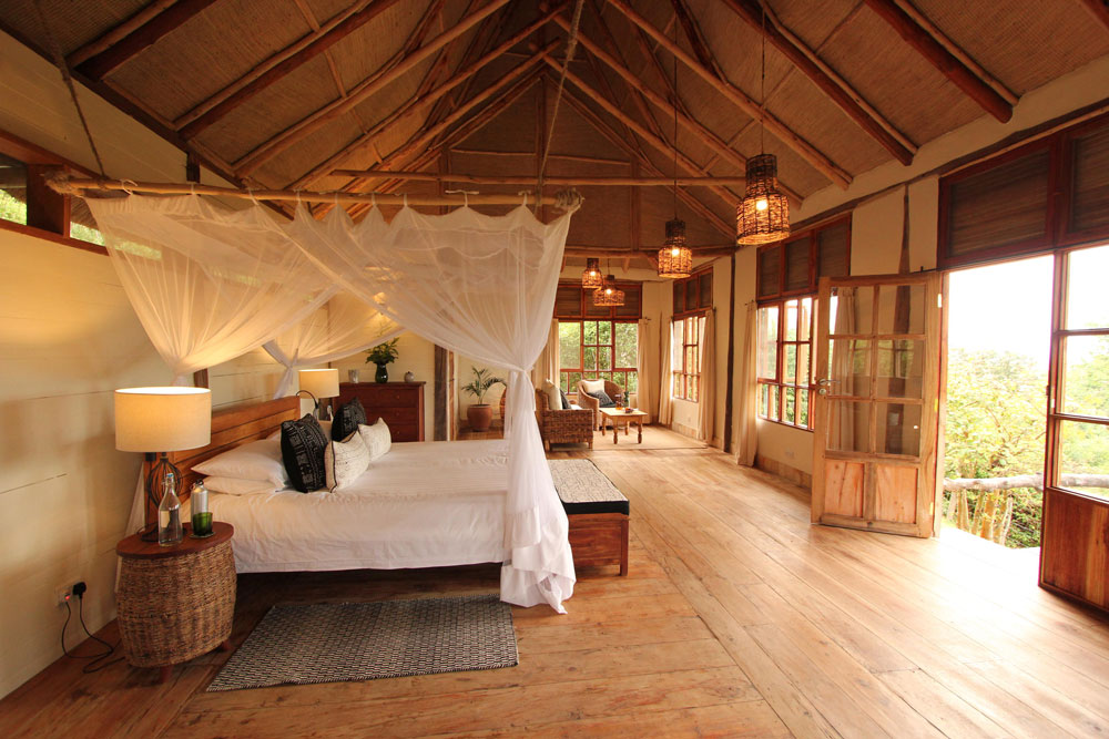 Bedroom at Kyambura Gorge Lodge / Courtesy of Volcanoes Safaris luxury Uganda safari