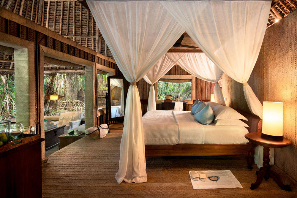 Bedroom at &Beyond Mnemba Island / Courtesy of &Beyond luxury Zanzibar beach resort