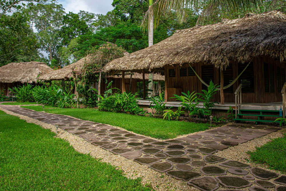 Cottages at Chan Chich Lodge / Courtesy of Chan Chich Lodge luxury Belize eco lodge