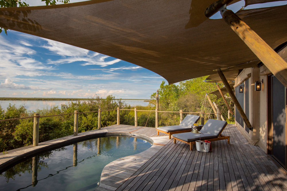 Family tent pool DumaTau / Courtesy of Wilderness Safaris luxury Botswana safari