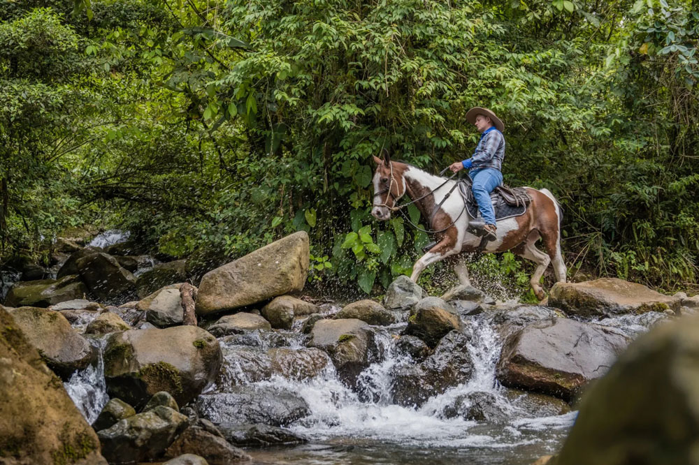Horseback riding at Hacienda Alta Gracia / Courtesy of Auberge Resorts Costa Rica luxury ecolodge