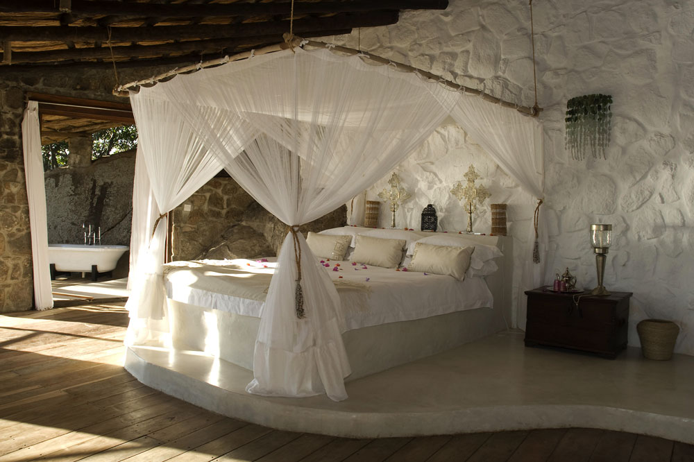 Nkwazi bedroom at Kaya Mawa / Courtesy of Green Safaris luxury Malawi beach resort