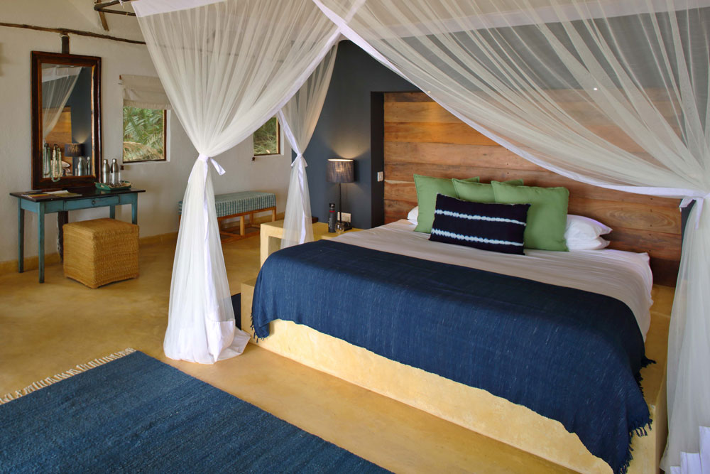 Bedroom at Rubondo Island Camp / Courtesy of Asilia Africa luxury Tanzania beach chimpanzee safari