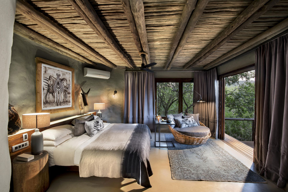 Suite bedroom at &Beyond Phinda Rock Lodge / Courtesy of &Beyond luxury South Africa safari