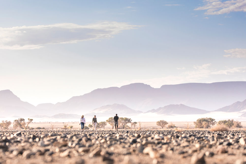 Desert walk at Little Kulala / Courtesy of Wilderness Safaris luxury Namibia safari