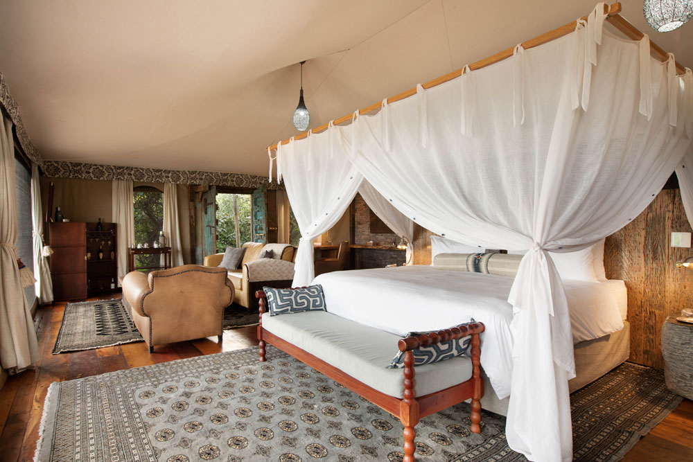 Tent bedroom at Tembo Plains Camp / Courtesy of Great Plains Conservation luxury Zimbabwe safari