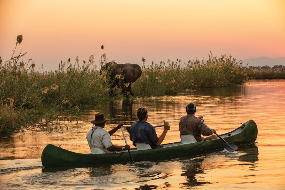 Canoeing at Tembo Plains Camp / Courtesy of Great Plains Conservation luxury Zimbabwe safari