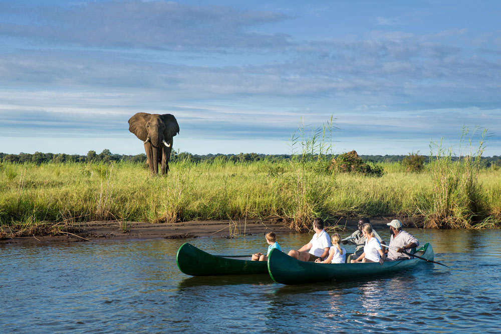 Canoeing at Tembo Plains Camp / Courtesy of Great Plains Conservation luxury Zimbabwe safari