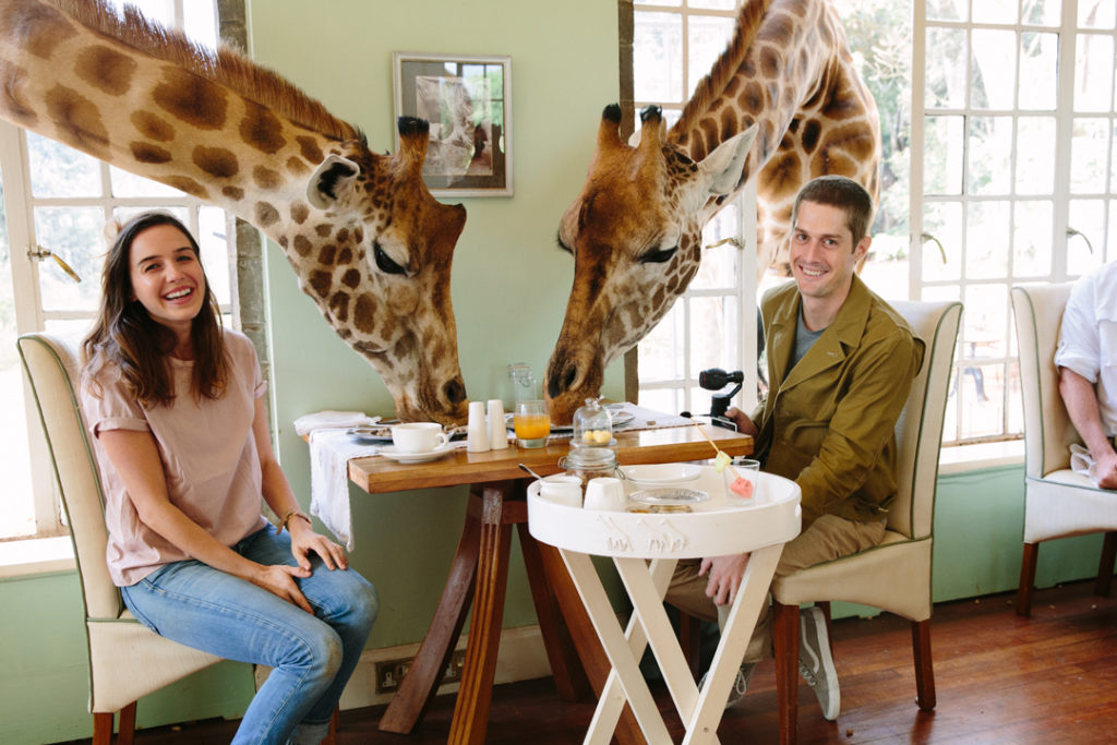 Scott and Wynn at Giraffe Manor in Keyna