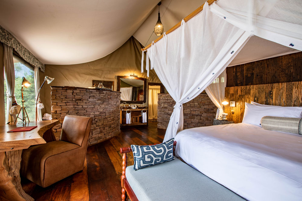 Tent bedroom at Tembo Plains Camp / Courtesy of Great Plains Conservation luxury Zimbabwe safari